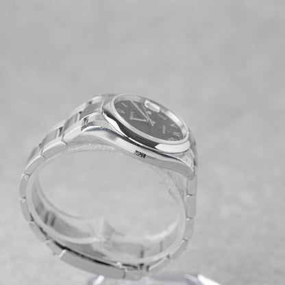 ROLEX DATEJUST 36 BLUE ROMAN DIAL REF: 116200 (NOS/STICKERS)